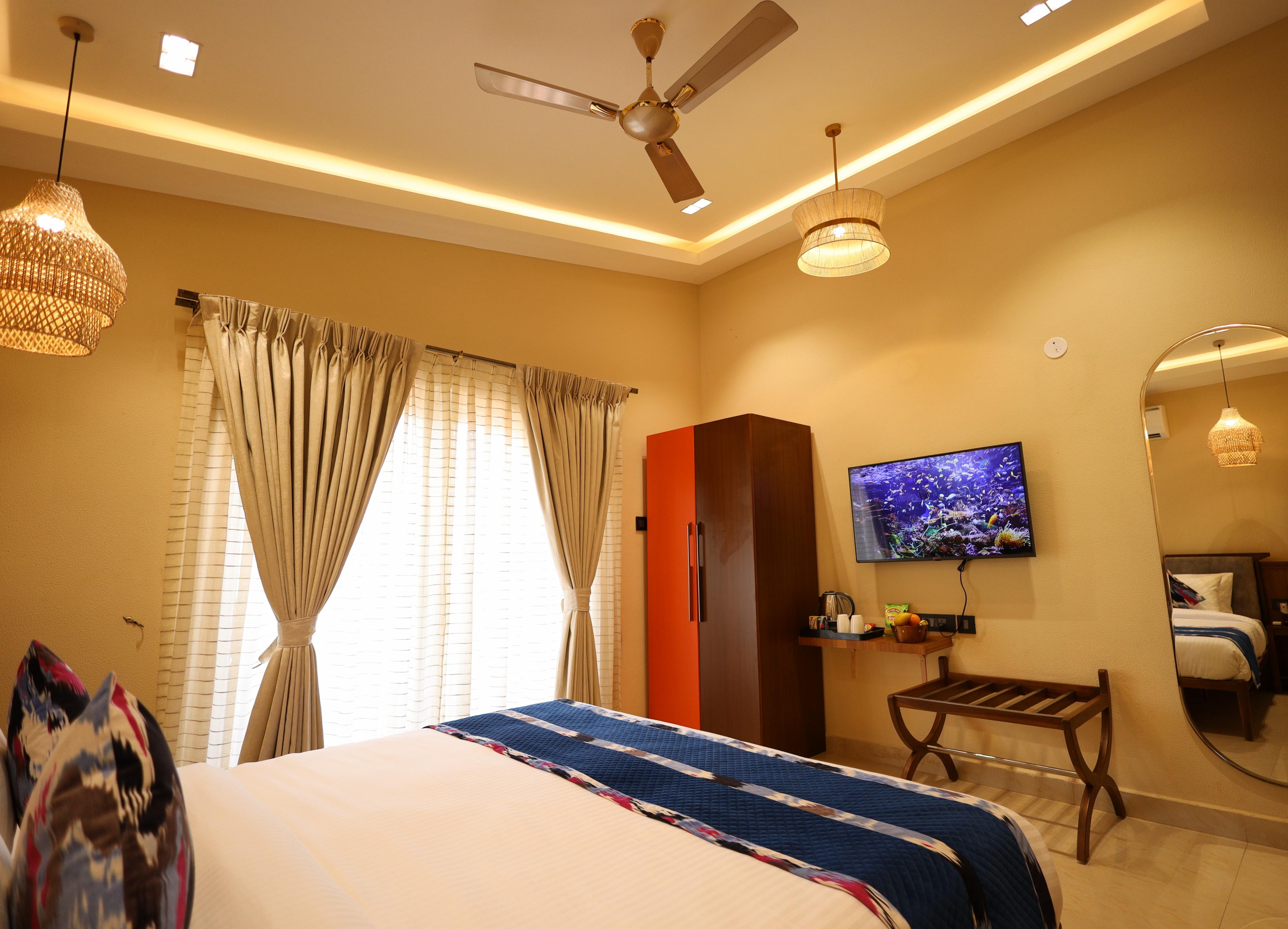 Foxoso Aaristo Baga Beach Resort - Tap to explore photos