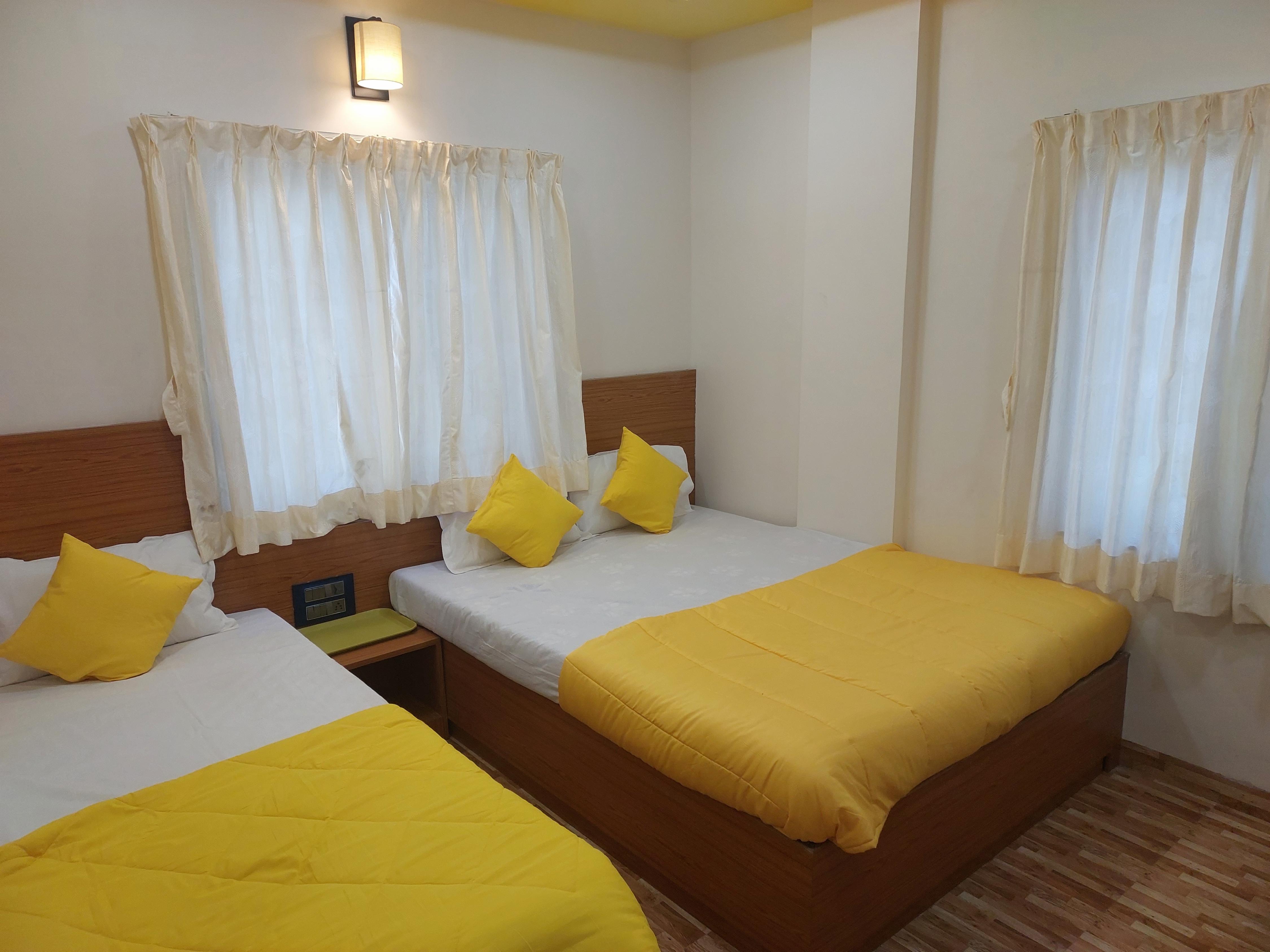 Hotel Sai Dakshina Inn Room Type - Executive Triple Room