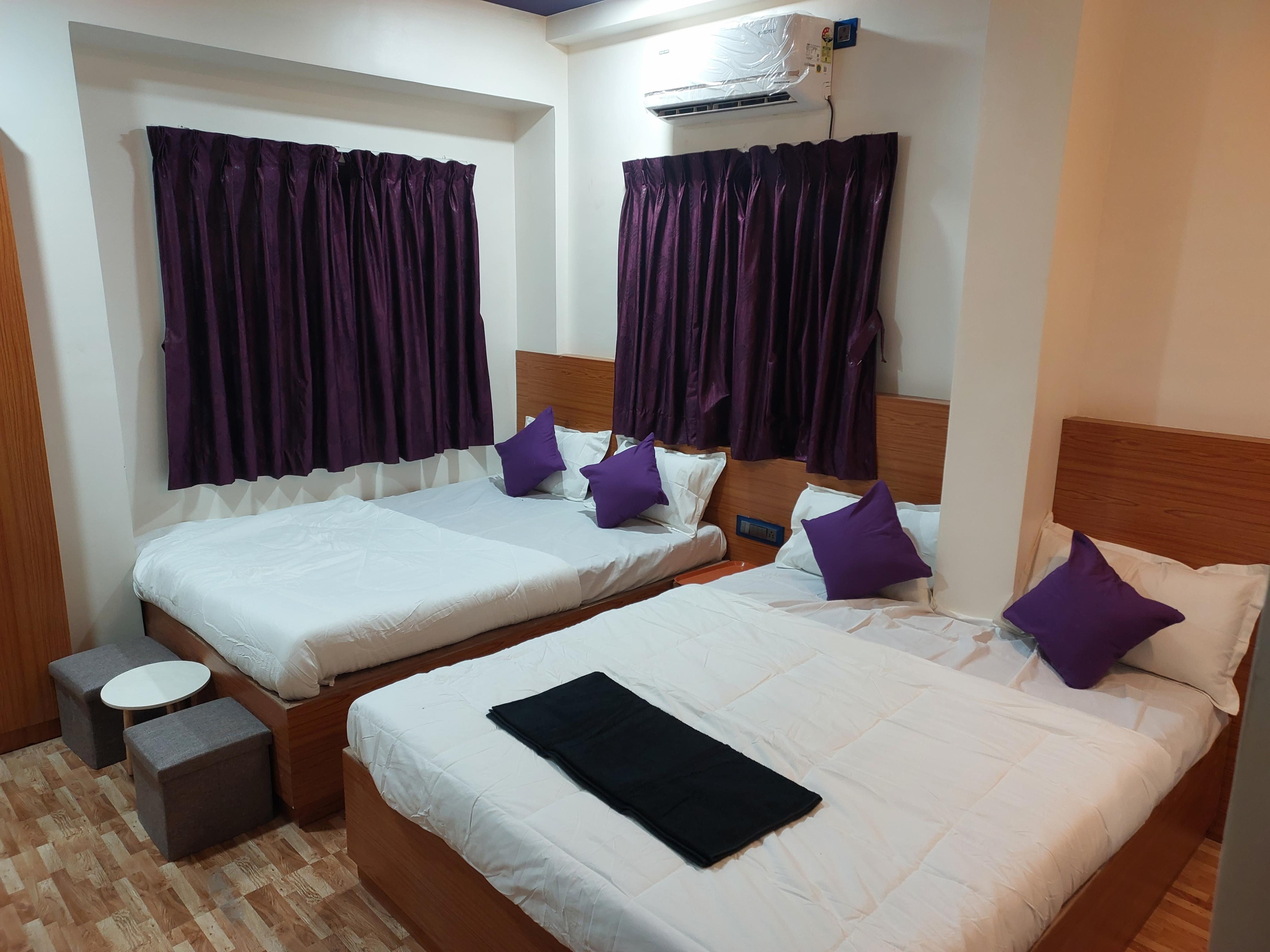 Hotel Sai Dakshina Inn Room Type - Economy Quadralap Room (AC 4 Bedded) Hotel Sai Dakshina Inn Room Type - Economy Quadralap Room (AC 4 Bedded)