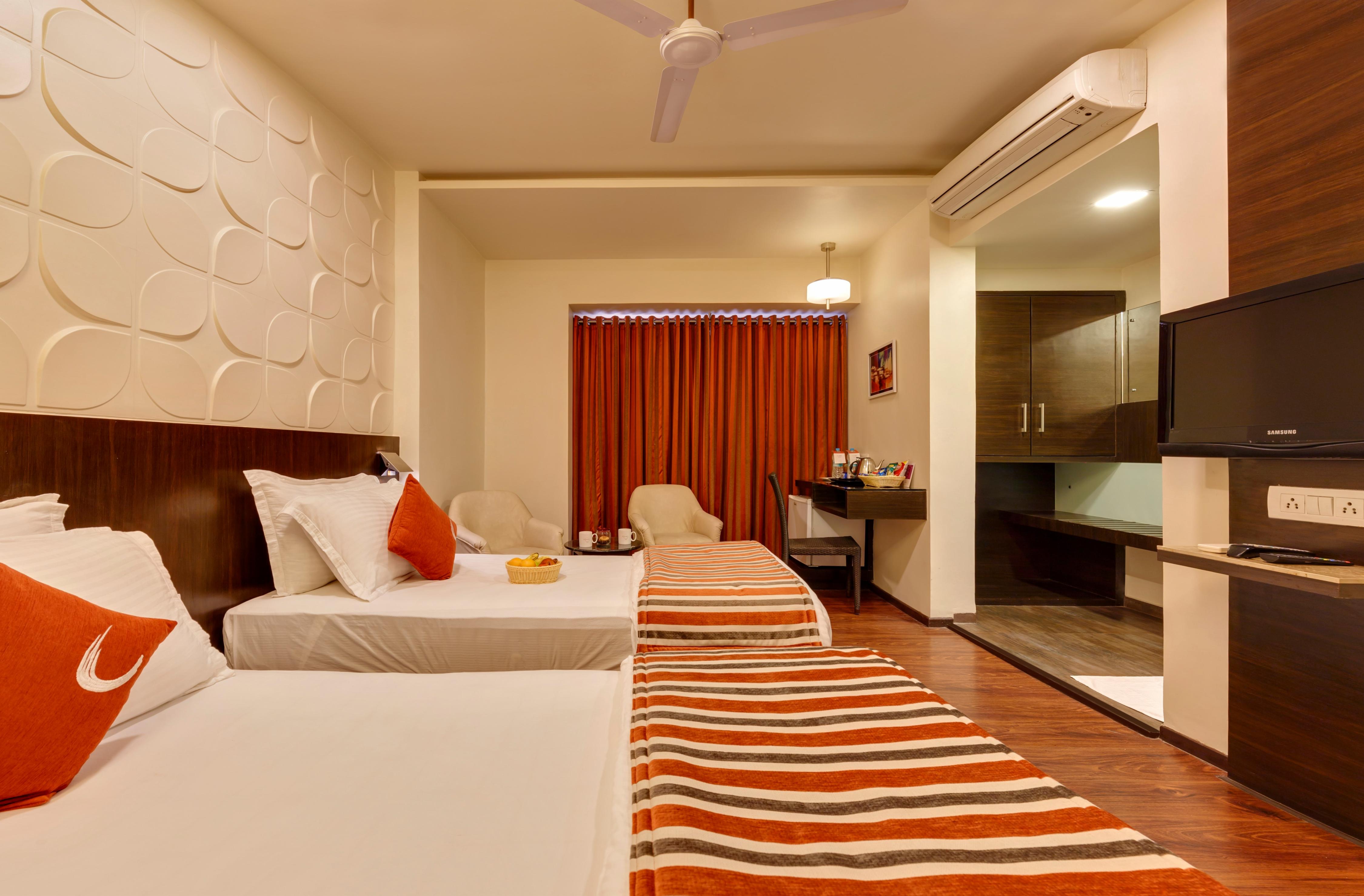 Regenta Place Raysons Kolhapur Room Type - Deluxe Twin Room ( Separate Bed)
