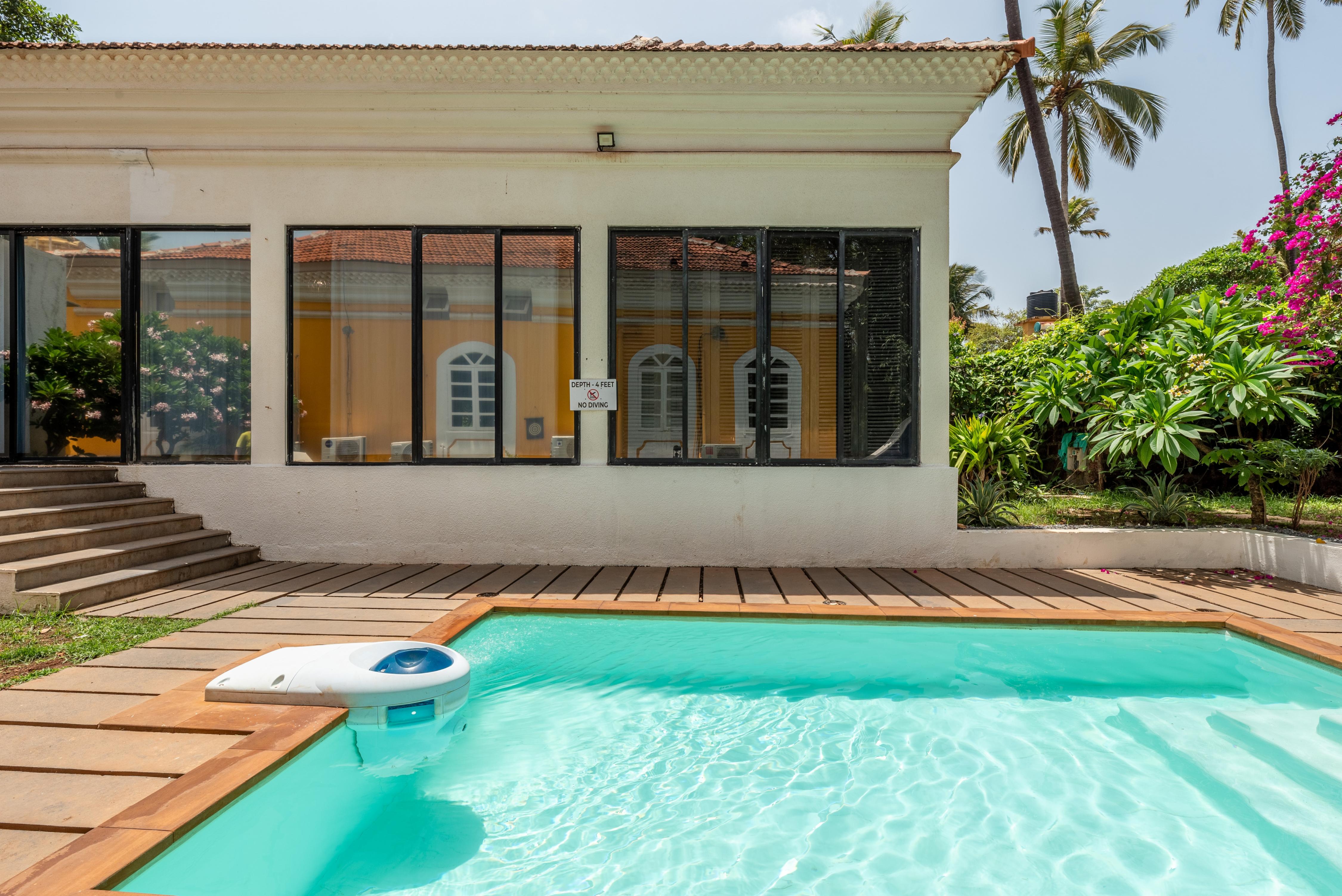 Frangipani 2BHK Portuguese villa with pool by Roamhome - Tap to explore photos
