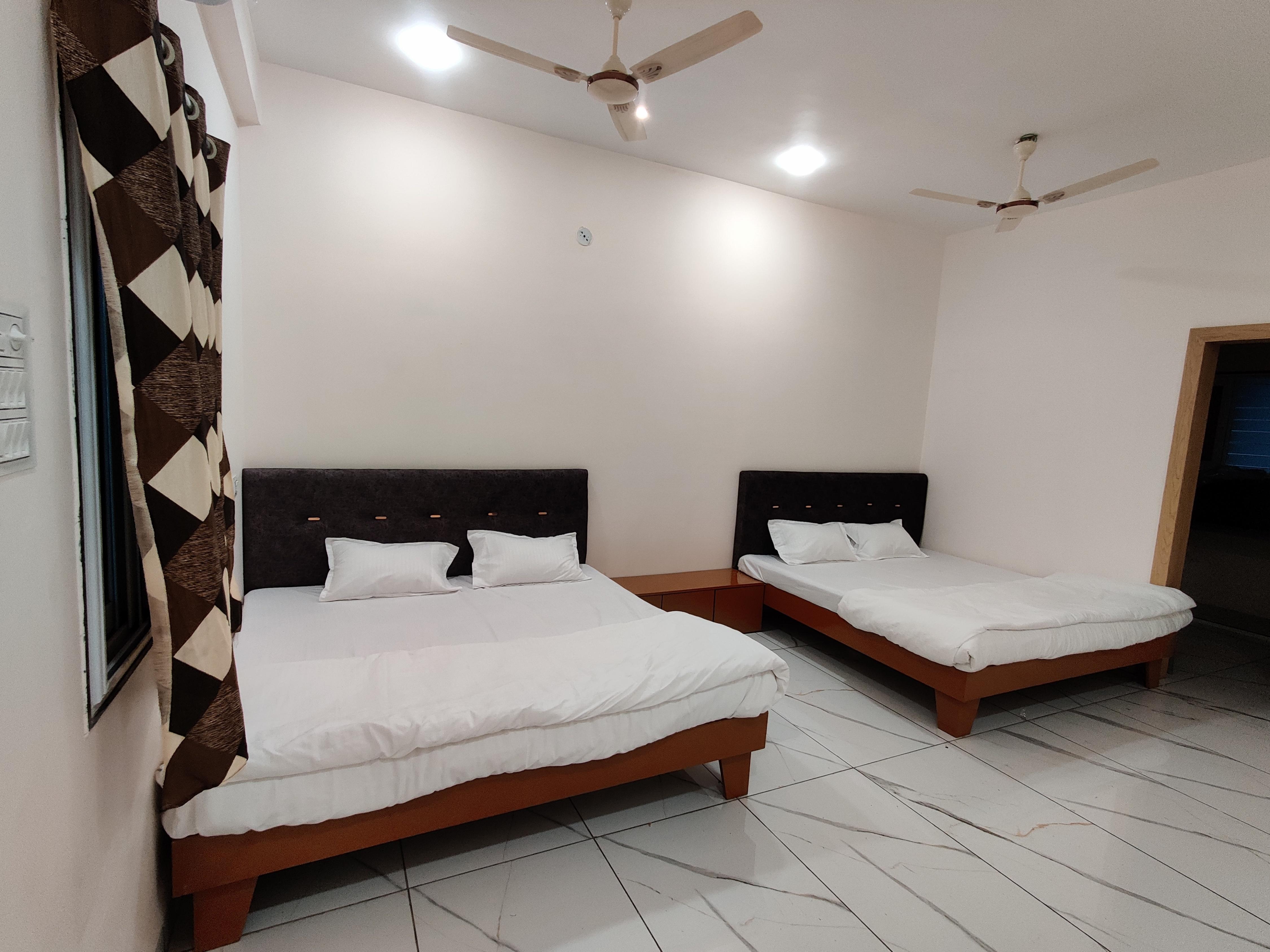 P square Inn Room Type - AC Hall With Attached Bathroom