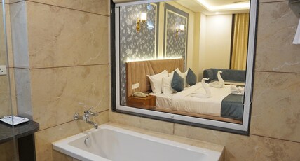Hotel Golden Orchard @ Rajpur Road Dehradun Room Type - Executive Suite Room with Bath Tub and Hill View Hotel Golden Orchard @ Rajpur Road Dehradun Room Type - Executive Suite Room with Bath Tub and Hill View