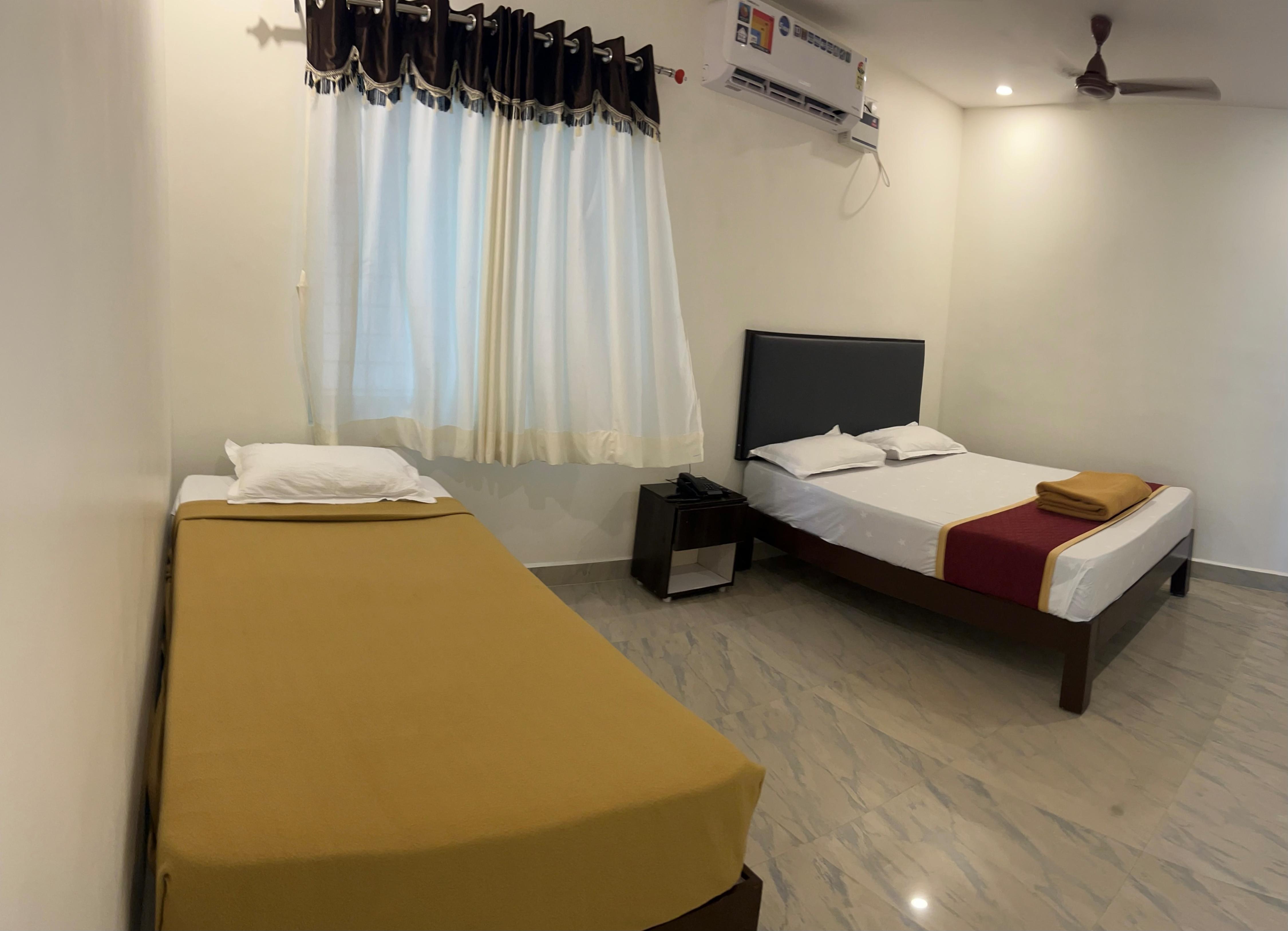 HOTEL SITAR GRAND Room Type - 3 Bedded AC Family Room