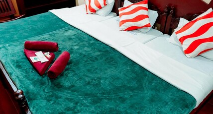 SREE HOLIDAY INN Room Type - Triple Deluxe Room