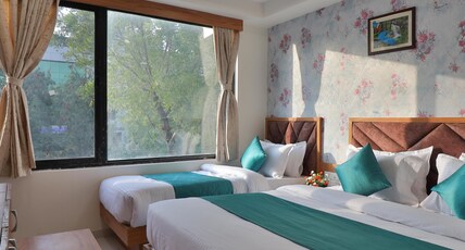 Hotel Vimal Inn Room Type - Deluxe Triple Room