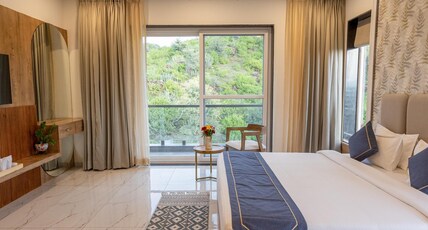 SURAMYA- A Luxury Boutique Hotel Room Type - PREMIER ROOM WITH BALCONY