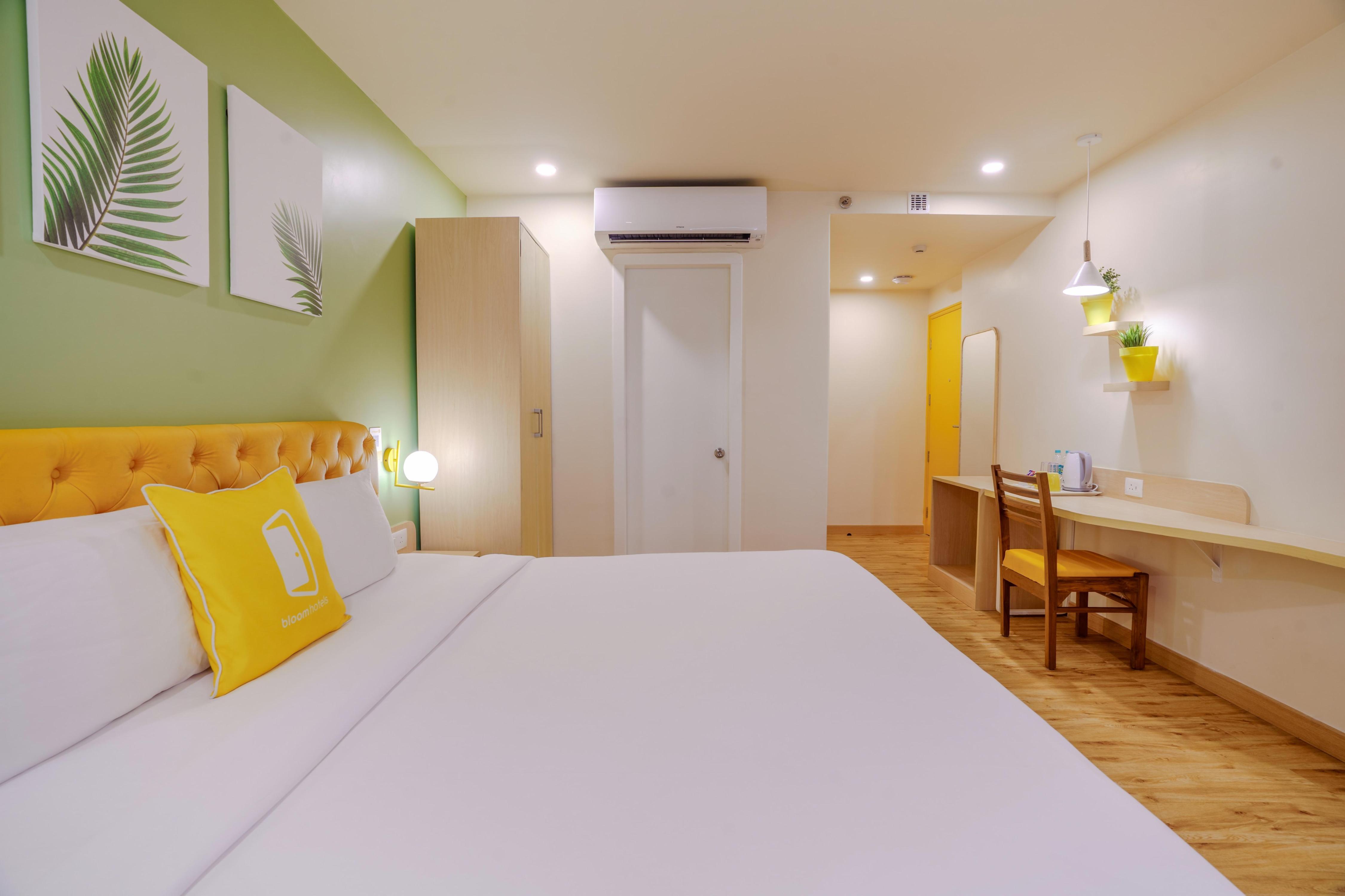 Bloom Hotel - Karol Bagh - Tap to explore photos