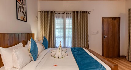 Shanthi Kunnj Riverside Exotica Room Type - Premier Room - Plantation view with a sit-out Shanthi Kunnj Riverside Exotica Room Type - Premier Room - Plantation view with a sit-out