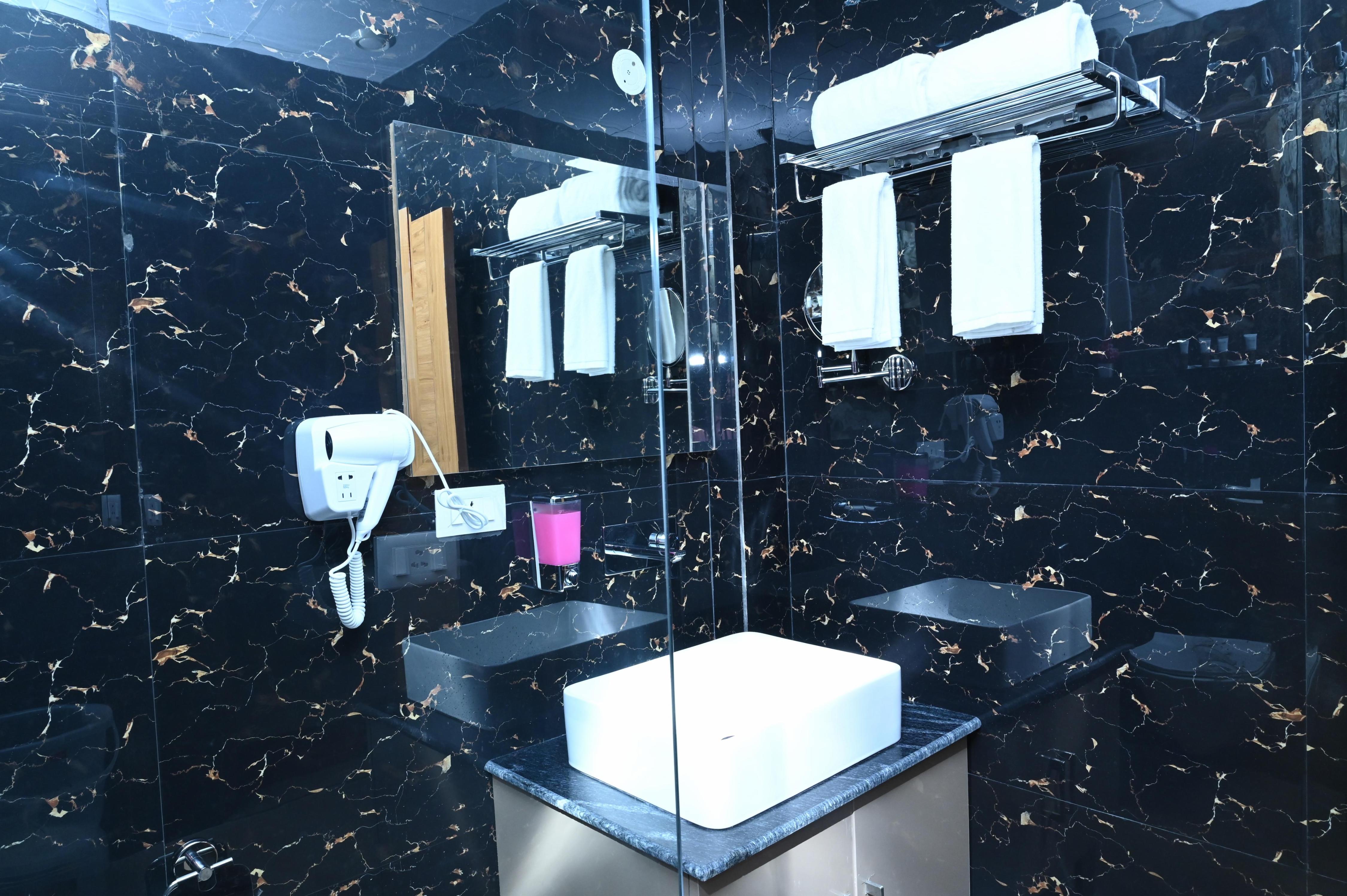 SPT Clarks Inn Suites - Tap to explore photos