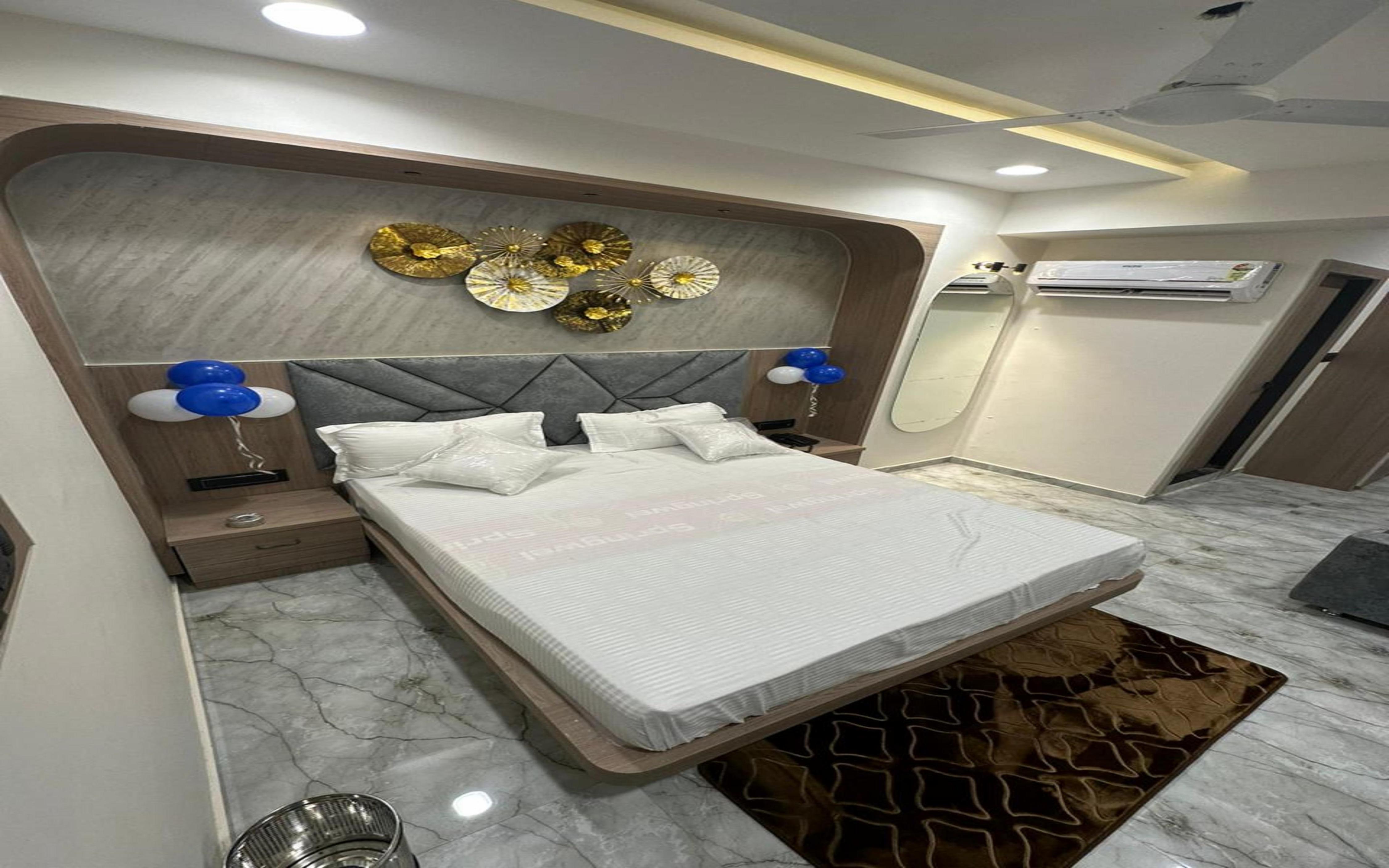 Hotel Marigold Naroda Room Type - Deluxe Room Hotel Marigold Naroda Room Type - Deluxe Room