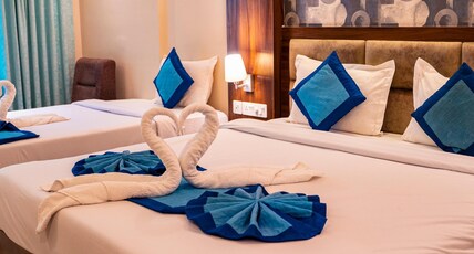 HOTEL AMBIKA PALACE, 150mtrs FROM GOLDEN BEACH Room Type - SUPER DELUXE (1 king and 01 twin Bed) HOTEL AMBIKA PALACE, 150mtrs FROM GOLDEN BEACH Room Type - SUPER DELUXE (1 king and 01 twin Bed)