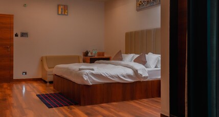 Airavat Hotel- Pure Veg. Room Type - Executive Deluxe