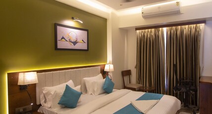 Monarch Guestline Magarpatta Room Type - Deluxe King Bed Room