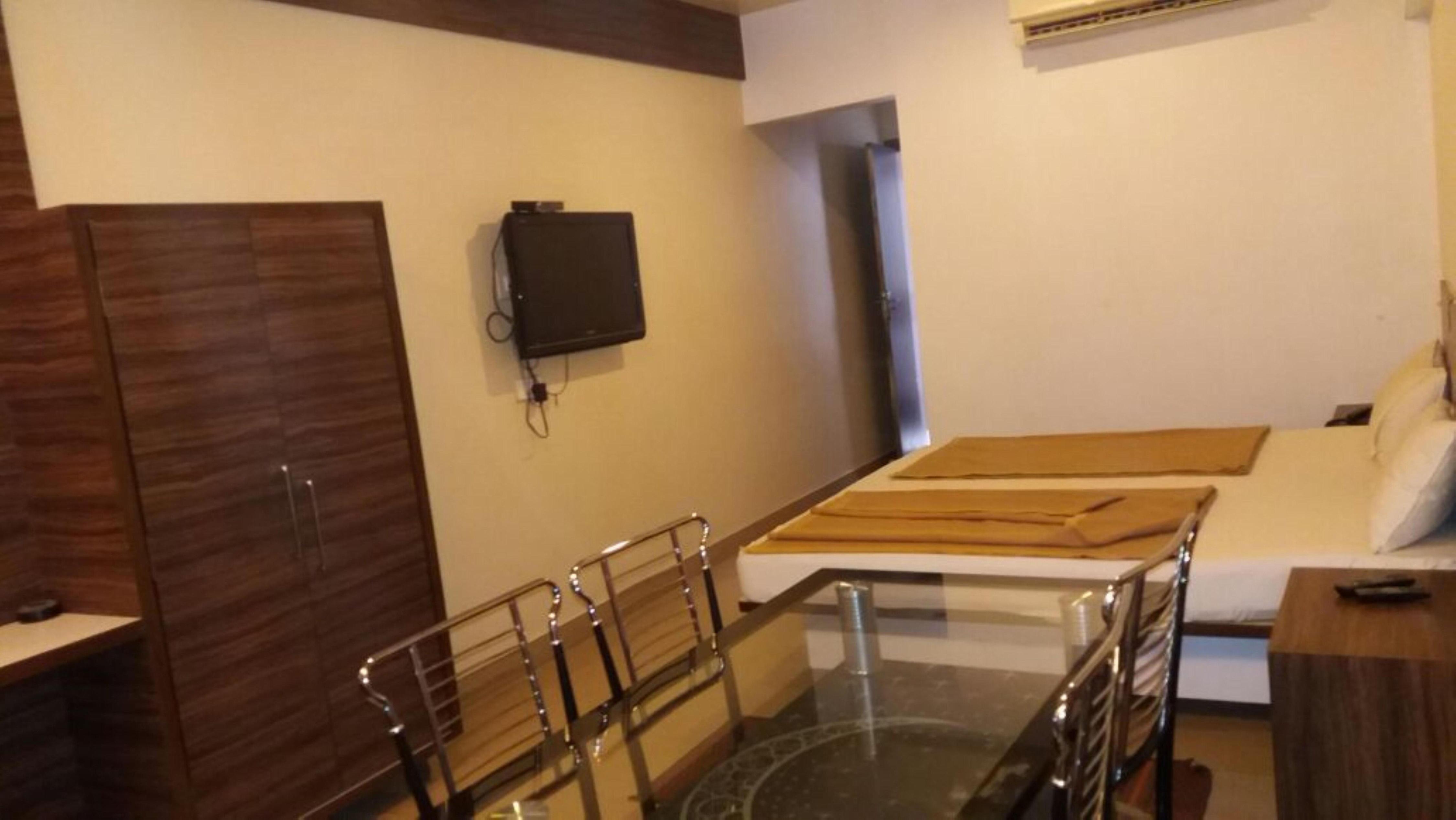 HOTEL NANDINI - Tap to explore photos