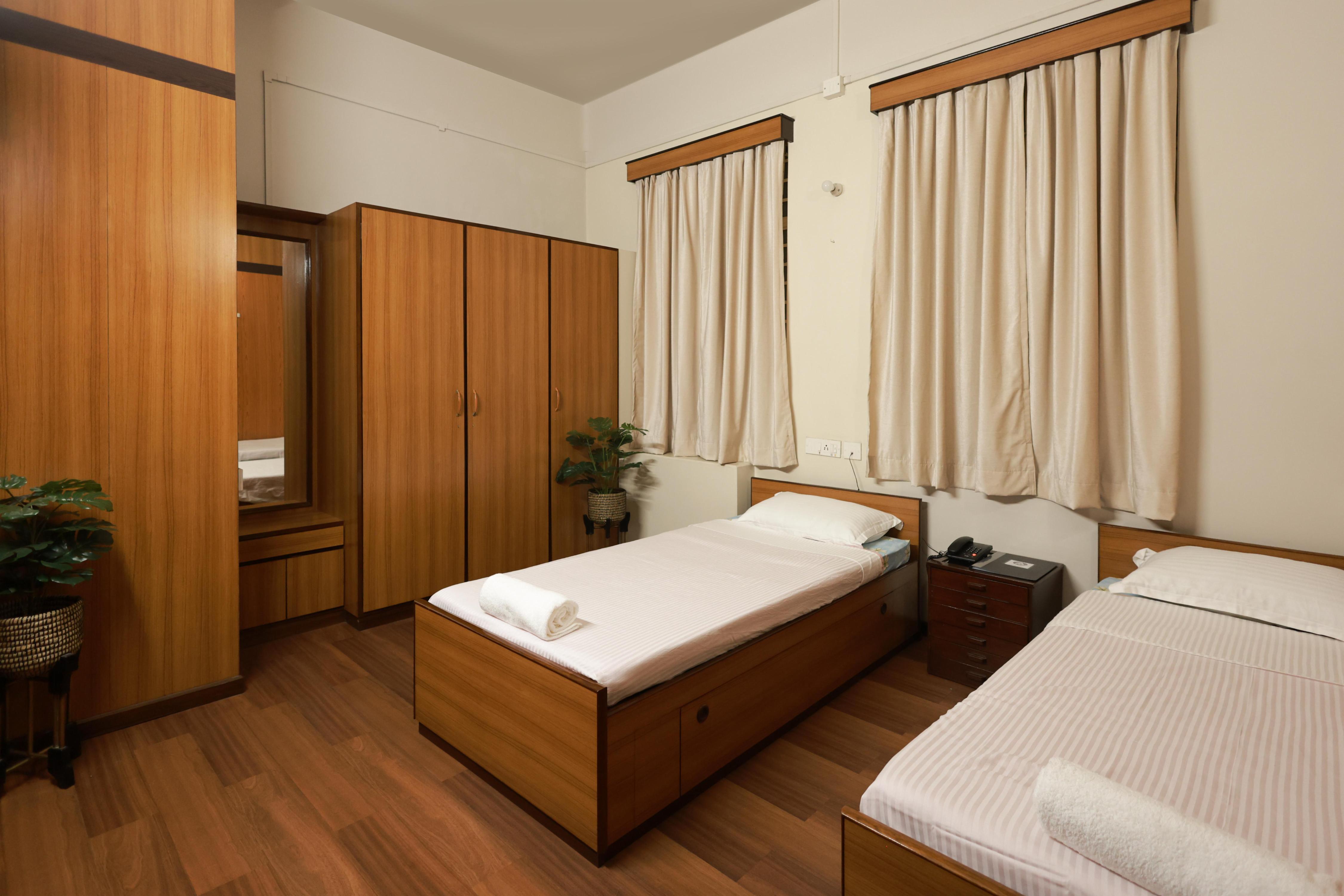 Corporate Guest House Room Type - Twin Bed Room (No attached bathroom)