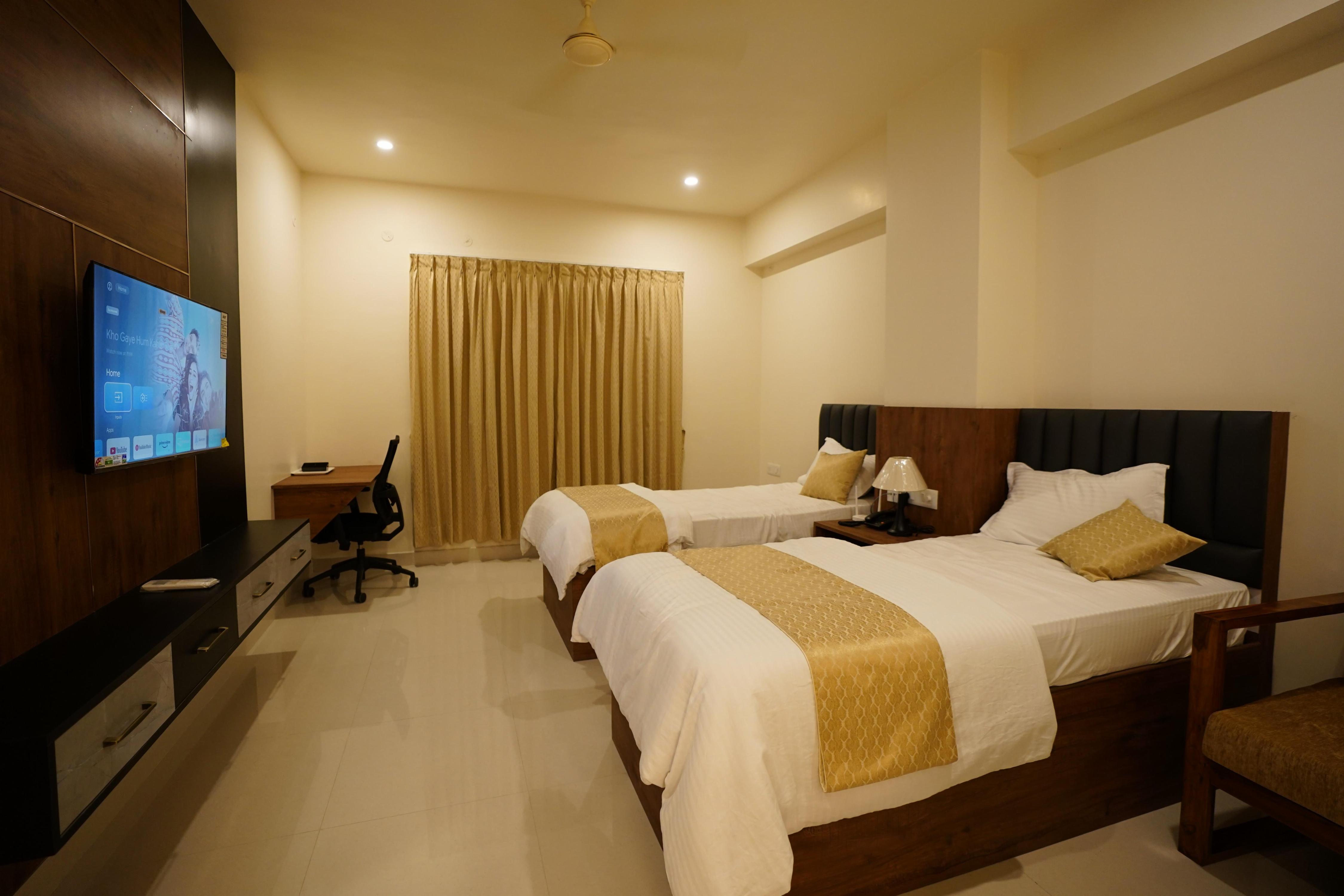 DrizzleDrop Inn Chennai Room Type - Family Room