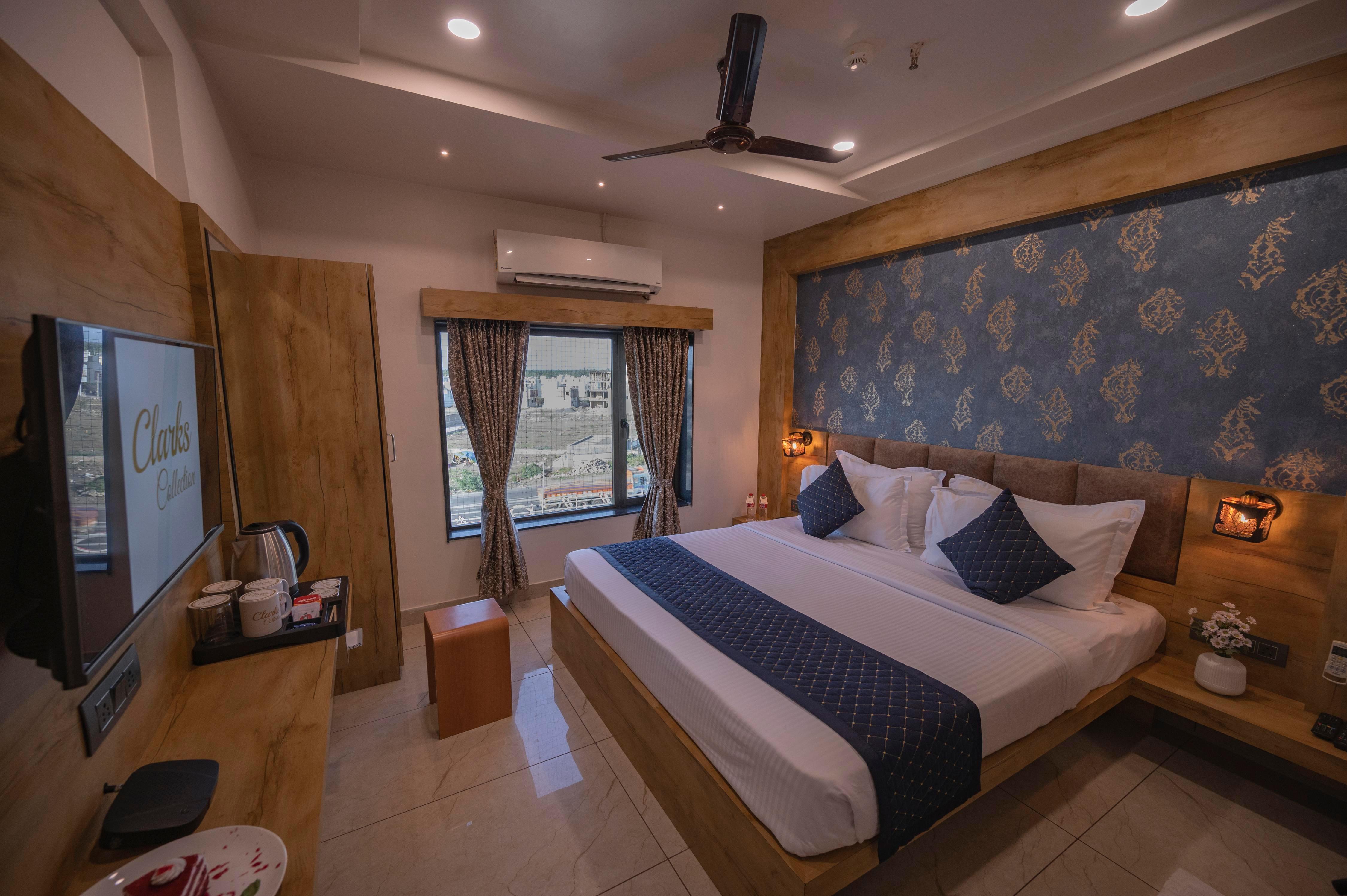 Clarks Collection Somnath - Pure Veg Room Type - Deluxe room with Queen Bed and City view
