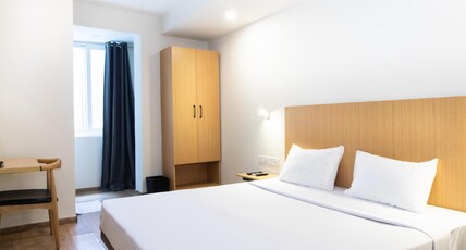 Sanctum Suites Richmond Road Bangalore Room Type - Deluxe Queen Room