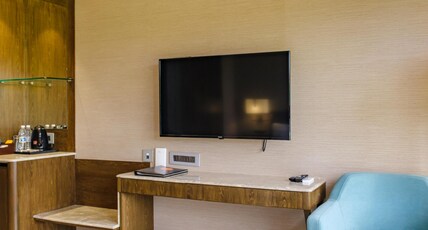 RIVERSIDE SUITES AT PANJIM GYMKHANA Room Type - Deluxe Room with Cricket Field View Double Bed RIVERSIDE SUITES AT PANJIM GYMKHANA Room Type - Deluxe Room with Cricket Field View Double Bed
