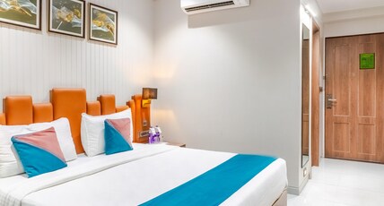 Pride Elite Dwarka Room Type - Deluxe Room