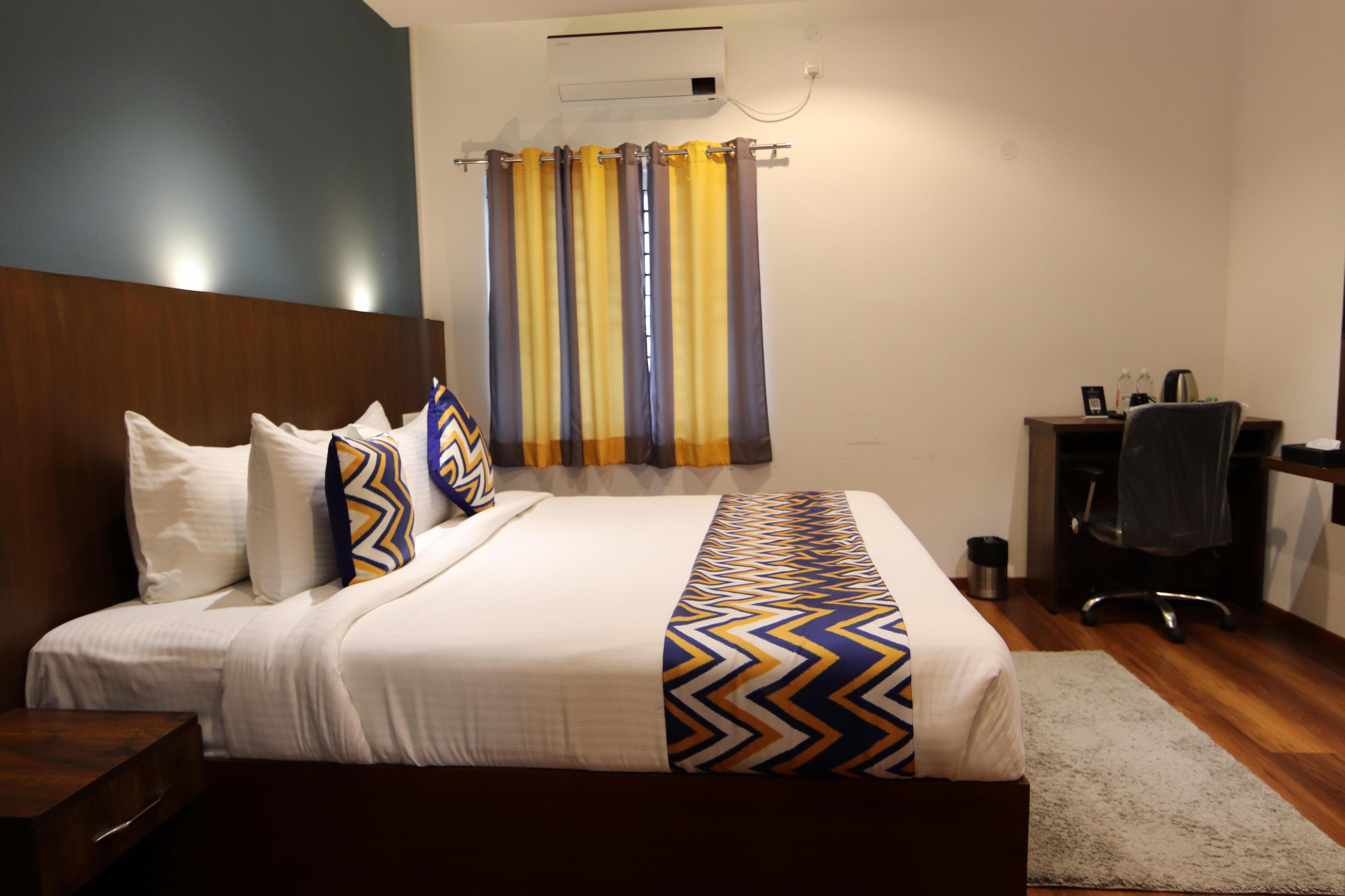 Athulya Residence Suite Rooms - Tap to explore photos