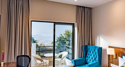 Regenta place Panchkula Morni Hills Room Type - Executive Room with Private Balcony and Lake View- Enjoy Complimentary Hi-Tea Regenta place Panchkula Morni Hills Room Type - Executive Room with Private Balcony and Lake View- Enjoy Complimentary Hi-Tea