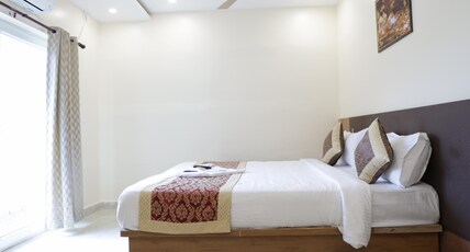 Hotel SJ Pride Inn Room Type - Deluxe AC