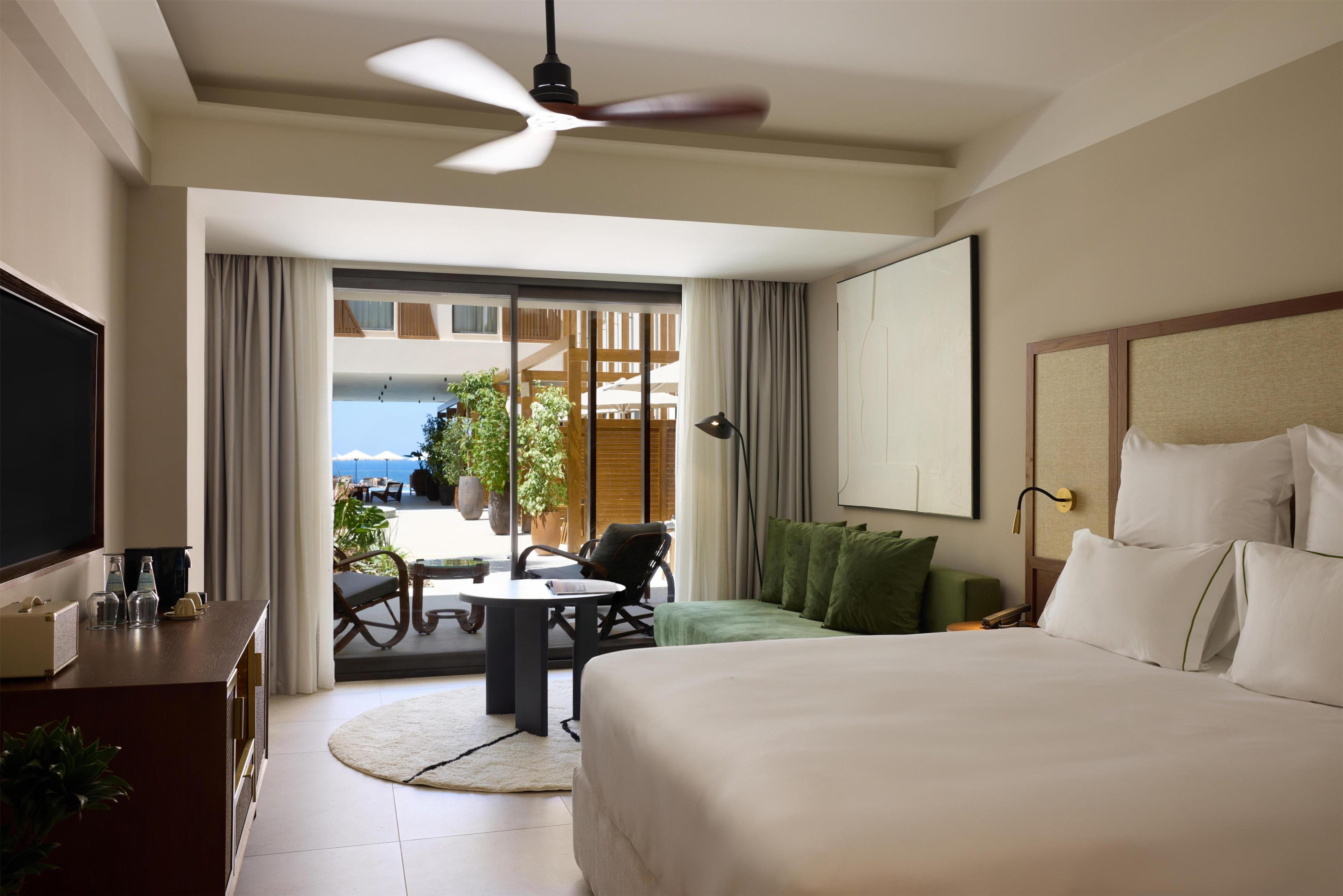 Isla Brown Resort Chania, Curio Collection by Hilton - Tap to explore photos