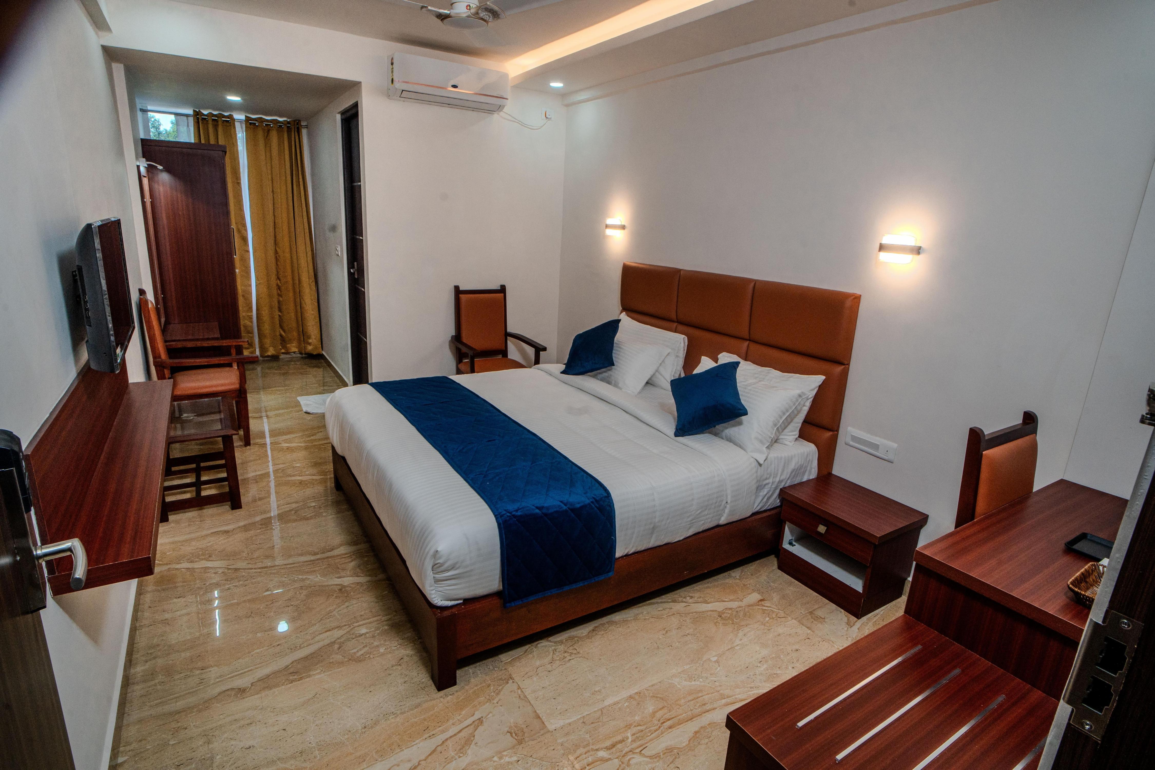 Hotel Fourmens Residency Room Type - Deluxe Room