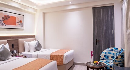 Regenta Inn Gurugram Room Type - Deluxe Twin Room -Enjoy Happy Hour 1+1 Mocktail Timing 11 Am - 7PM