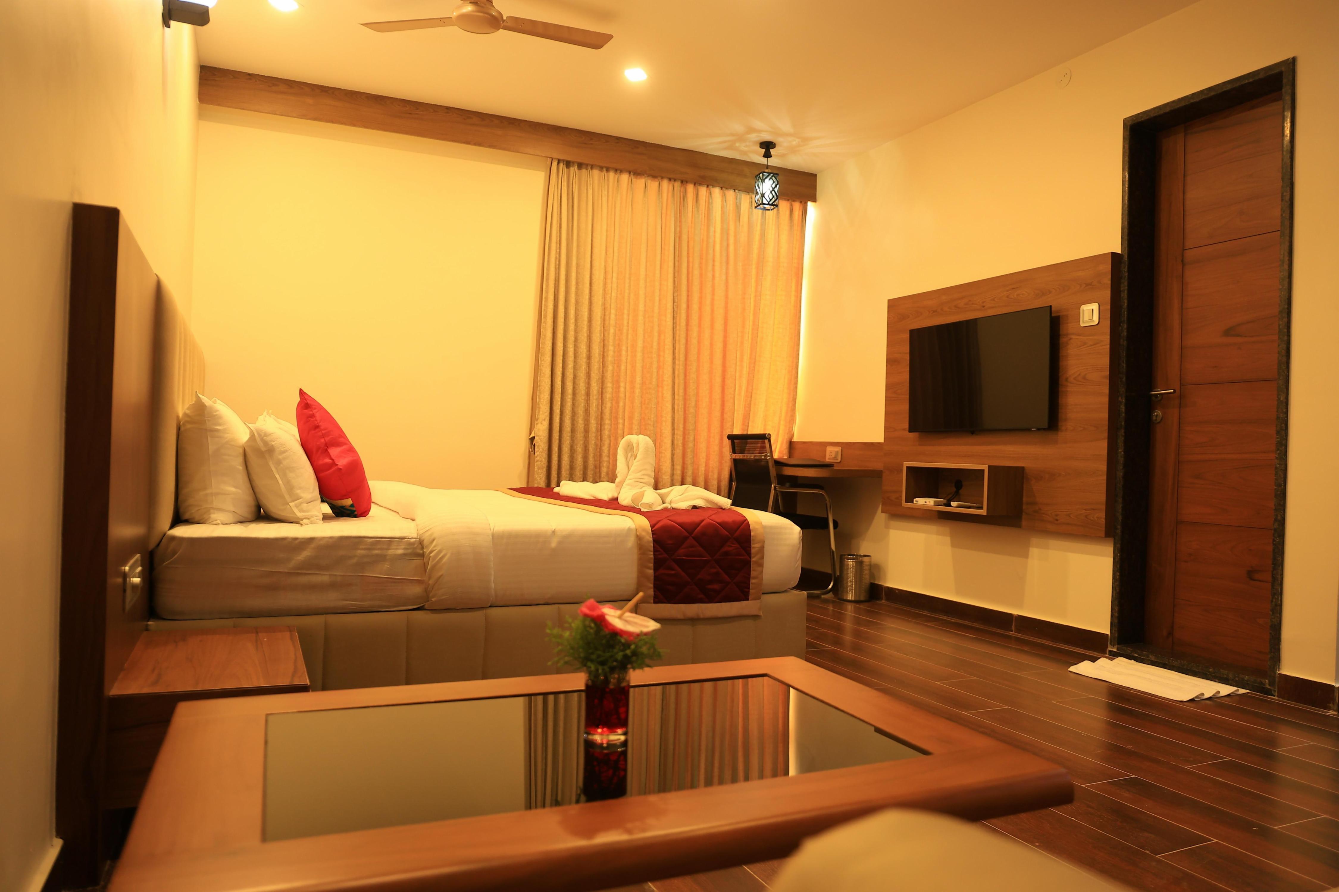 hotel Anand Grand - Tap to explore photos