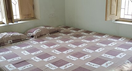 Buddha ashram guest house, bodhgaya Room Type - Deluxe AC