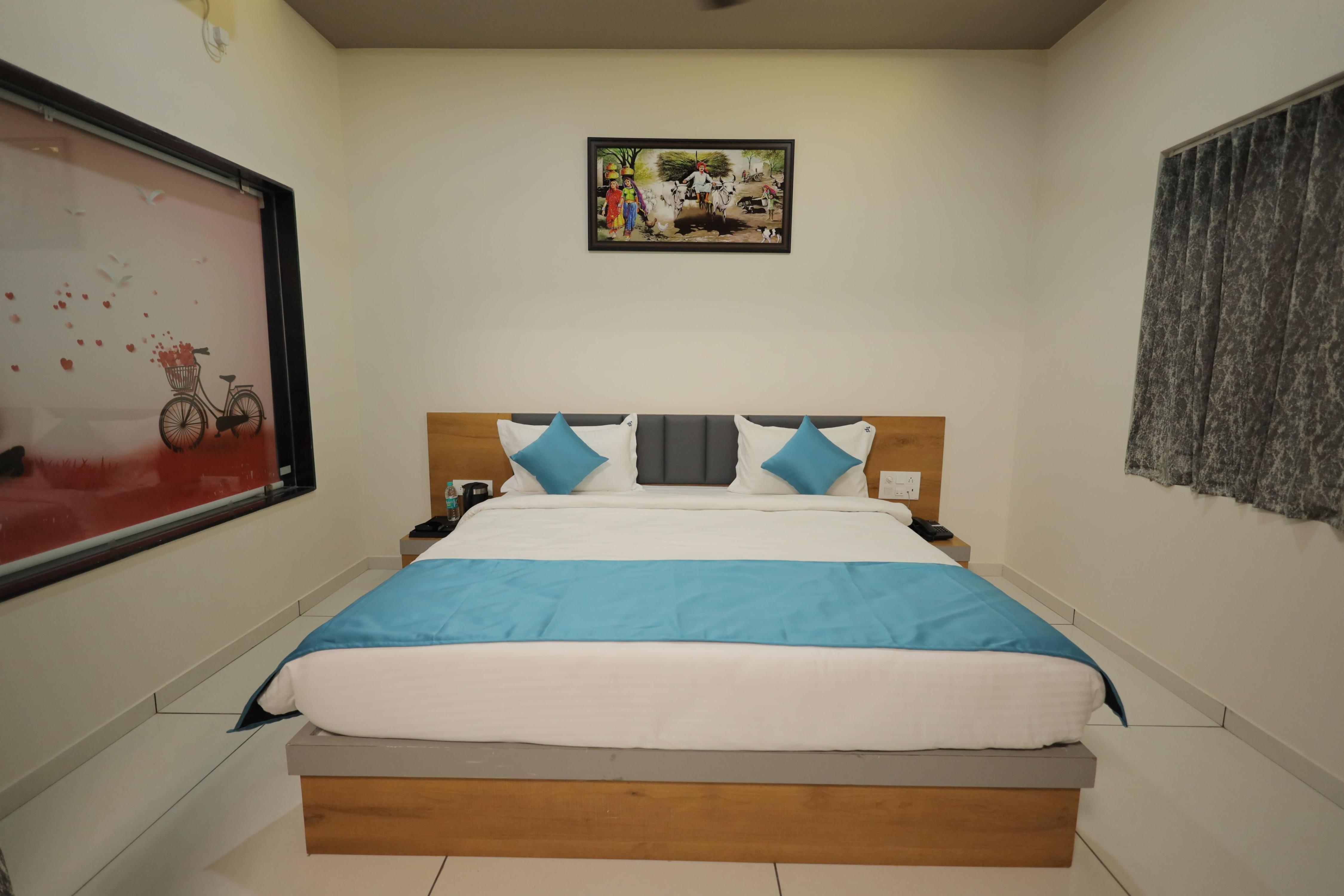 Hotel The Premier Somnath - Tap to explore photos