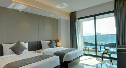 The Fern Residency Bhiwandi-Pimplas, Series by Marriott Room Type - Winter Green, Guest room, 2 Twin, Sofa bed, City view