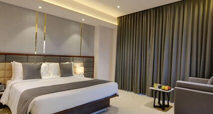 The Fern Residency Bhiwandi-Pimplas, Series by Marriott Room Type - Winter Green, Guest room, 1 King, Sofa bed, City view