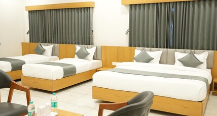 Hotel Amrut Inn Hospitalities Room Type - 4 Bed Family Room Hotel Amrut Inn Hospitalities Room Type - 4 Bed Family Room
