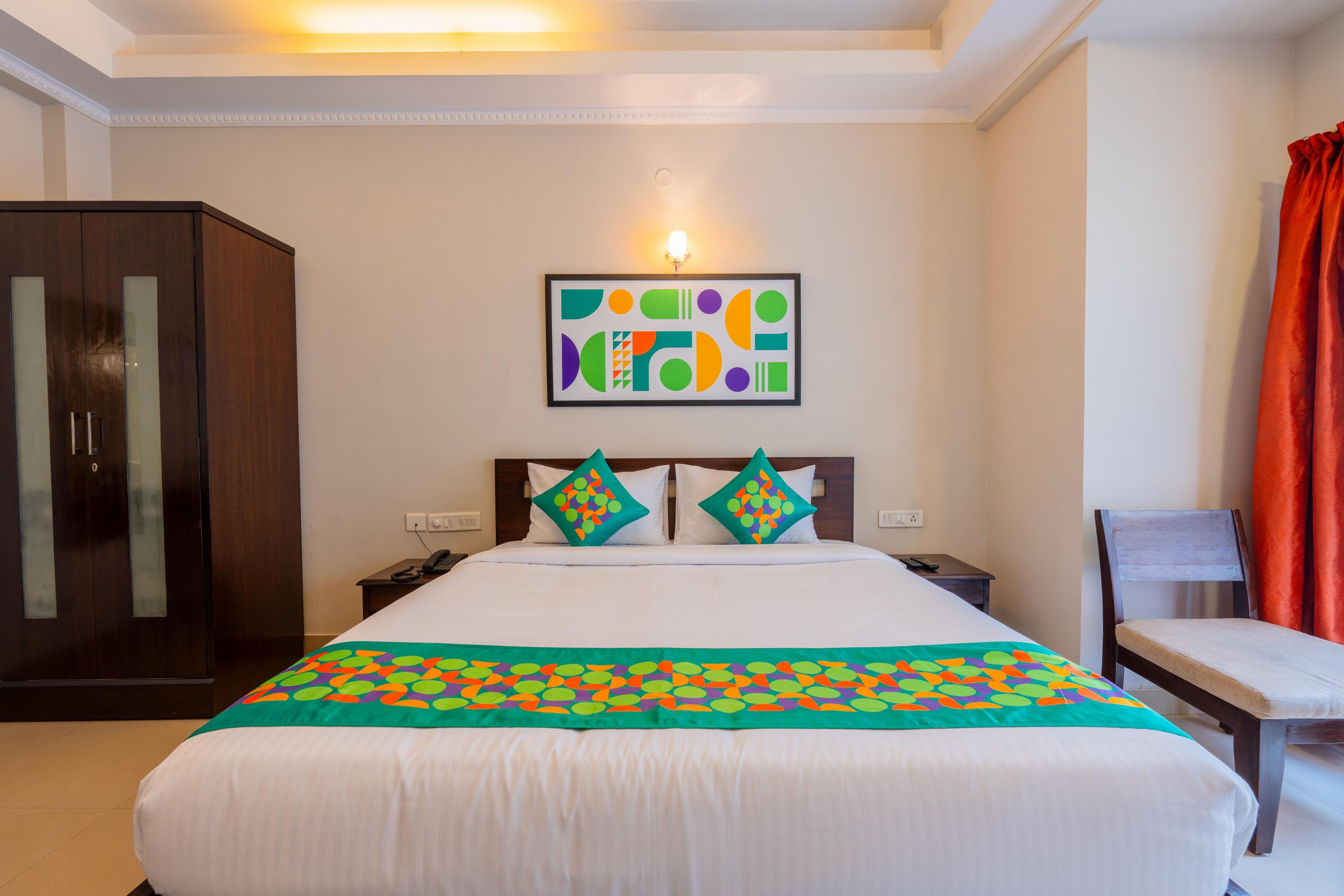 Treebo Ivory White Inn - Tap to explore photos