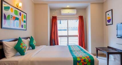 Treebo Ivory White Inn Room Type - Deluxe Room