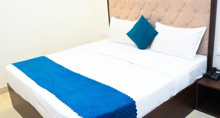 HOTEL INFRA VIEW Room Type - Deluxe Room