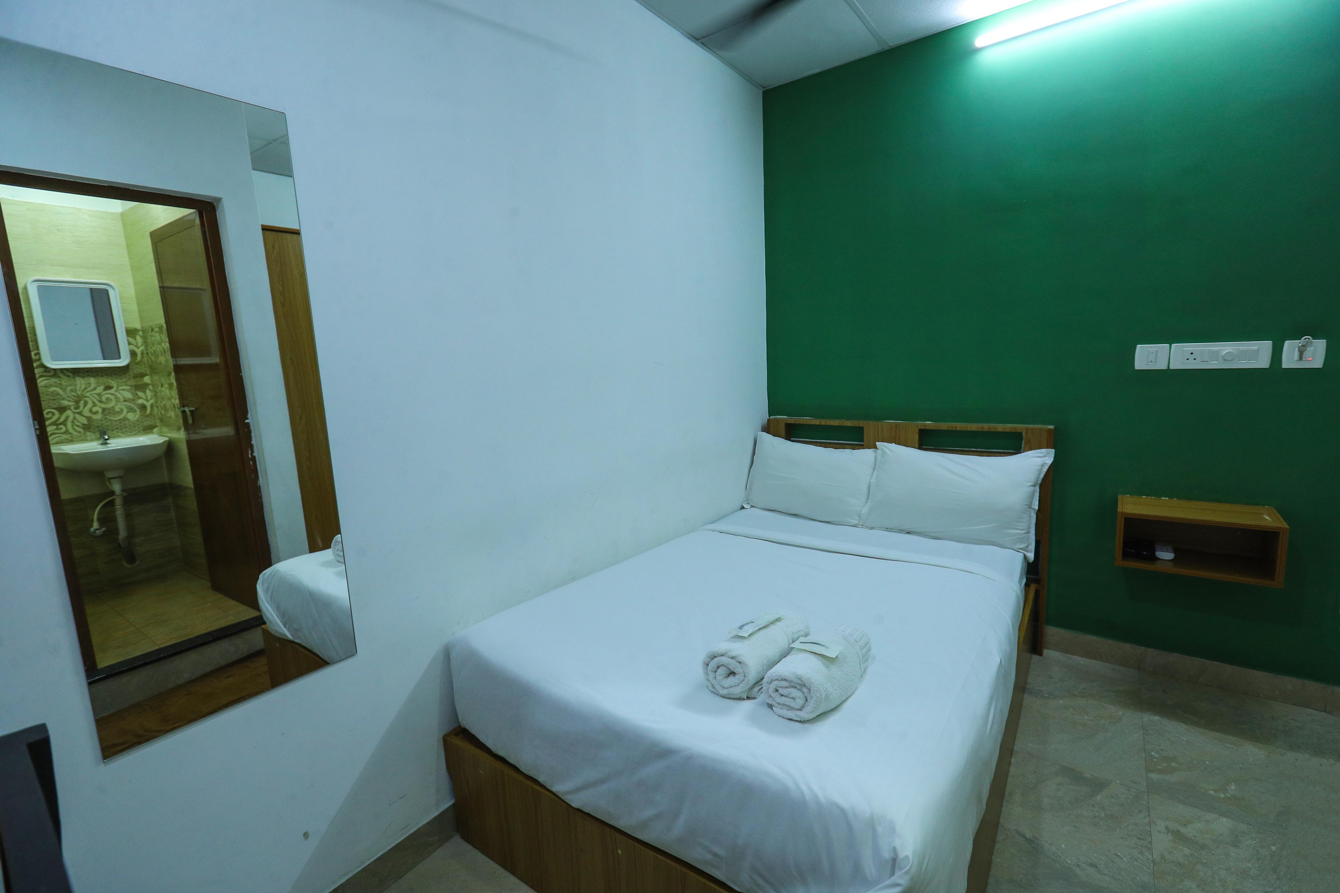 Hotel Metro Den - Tap to explore photos