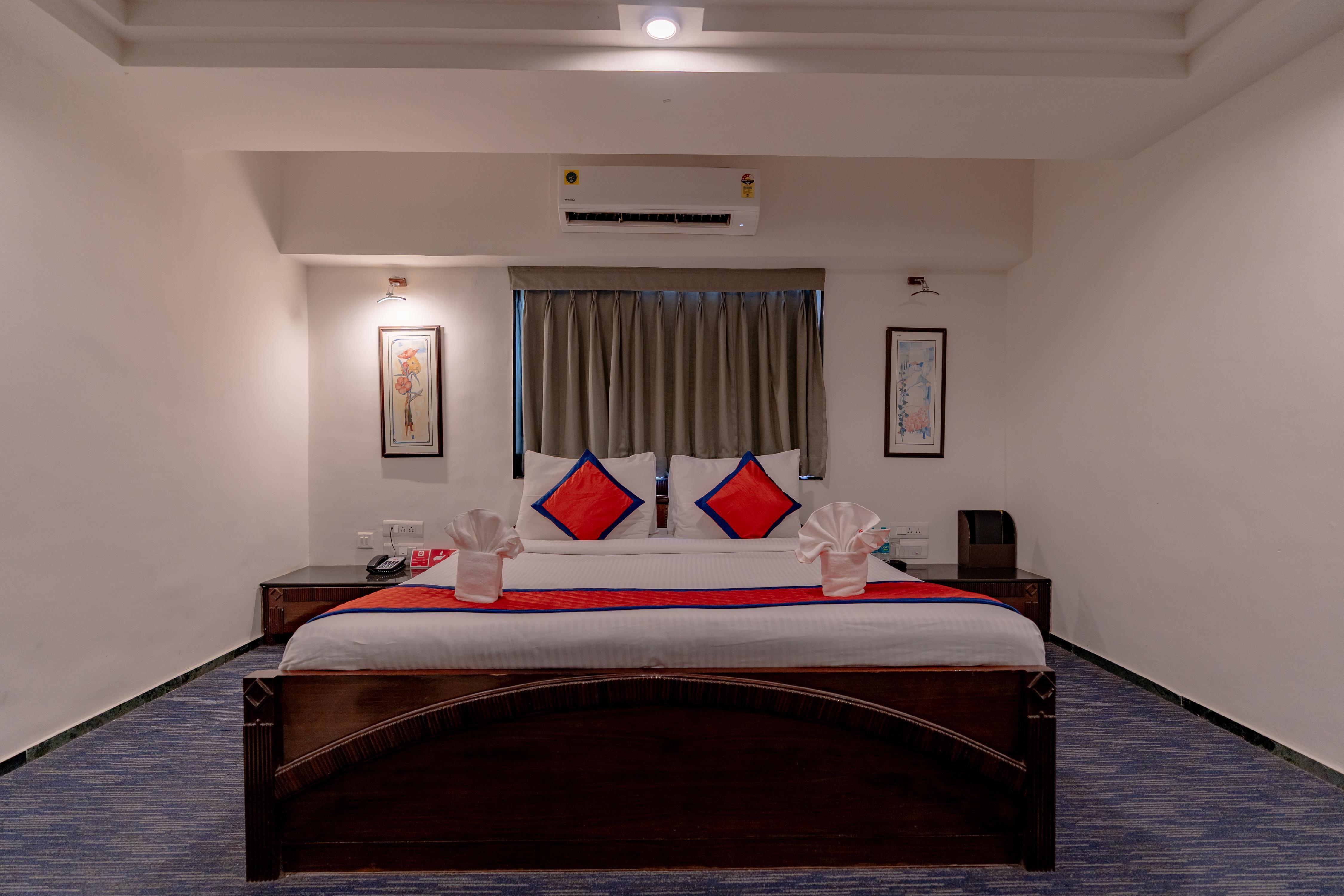 Hotel KK By Spree Rajkot - Tap to explore photos