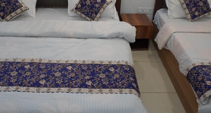 HOTEL RAJ HANS Room Type - Deluxe Triple Room ( 1 Double Bed + 1 Single Bed ) HOTEL RAJ HANS Room Type - Deluxe Triple Room ( 1 Double Bed + 1 Single Bed )