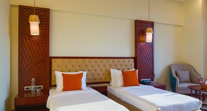 Alaya Stays | Golf Course Rd | Eternal Oasis Room Type - Twin Bed with City View