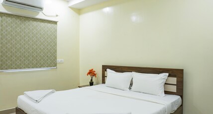 Marigold AtNest Kokapet Room Type - Queen Room