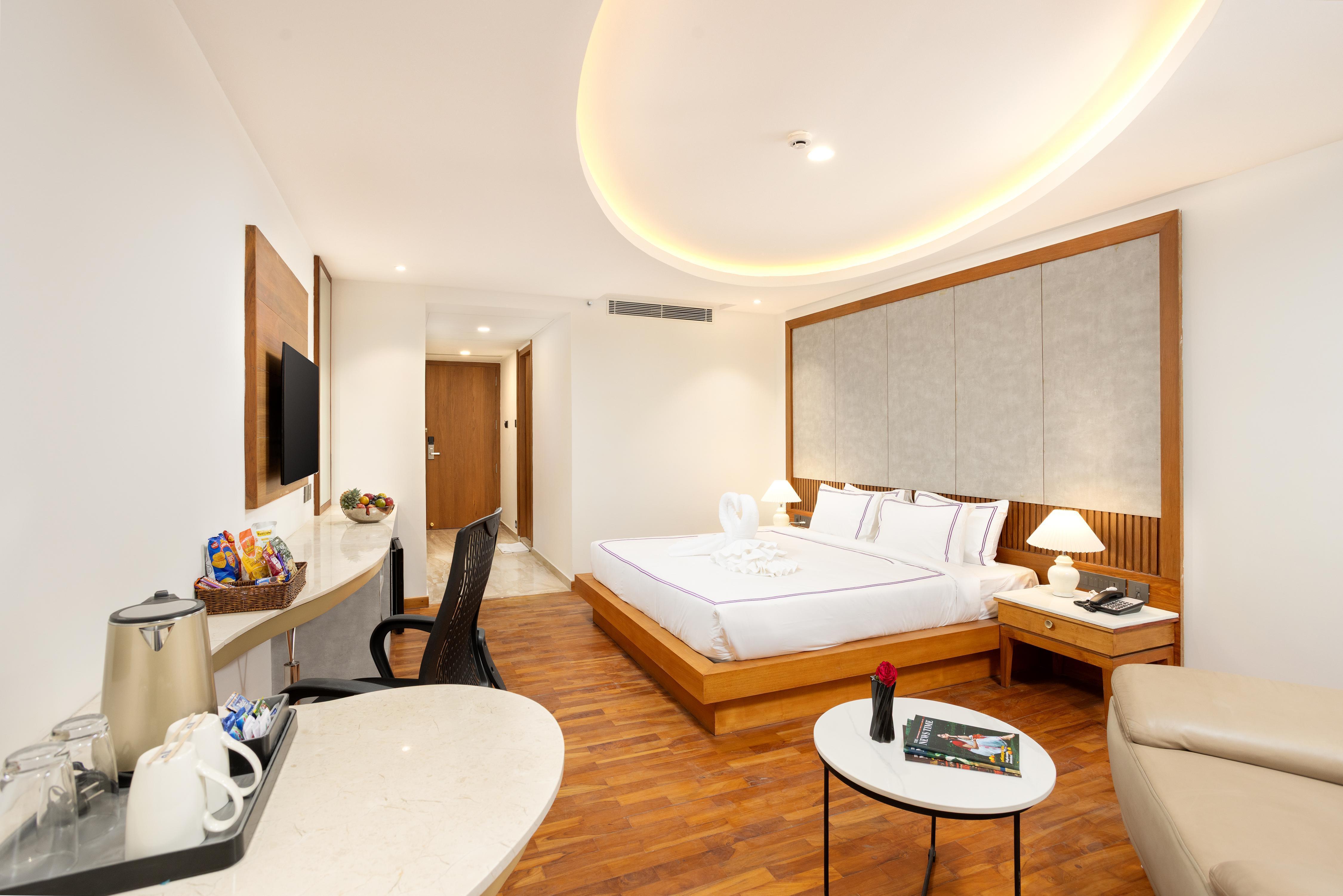 Hotel Explora Calicut by Nova - Tap to explore photos