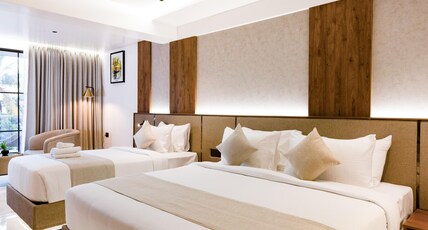 Royal Plaza Inn by RAK Rooms Room Type - Royal Pavilion Triple bed