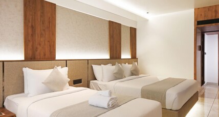 Royal Plaza Inn by RAK Rooms Room Type - Royal Residence Triple Bed