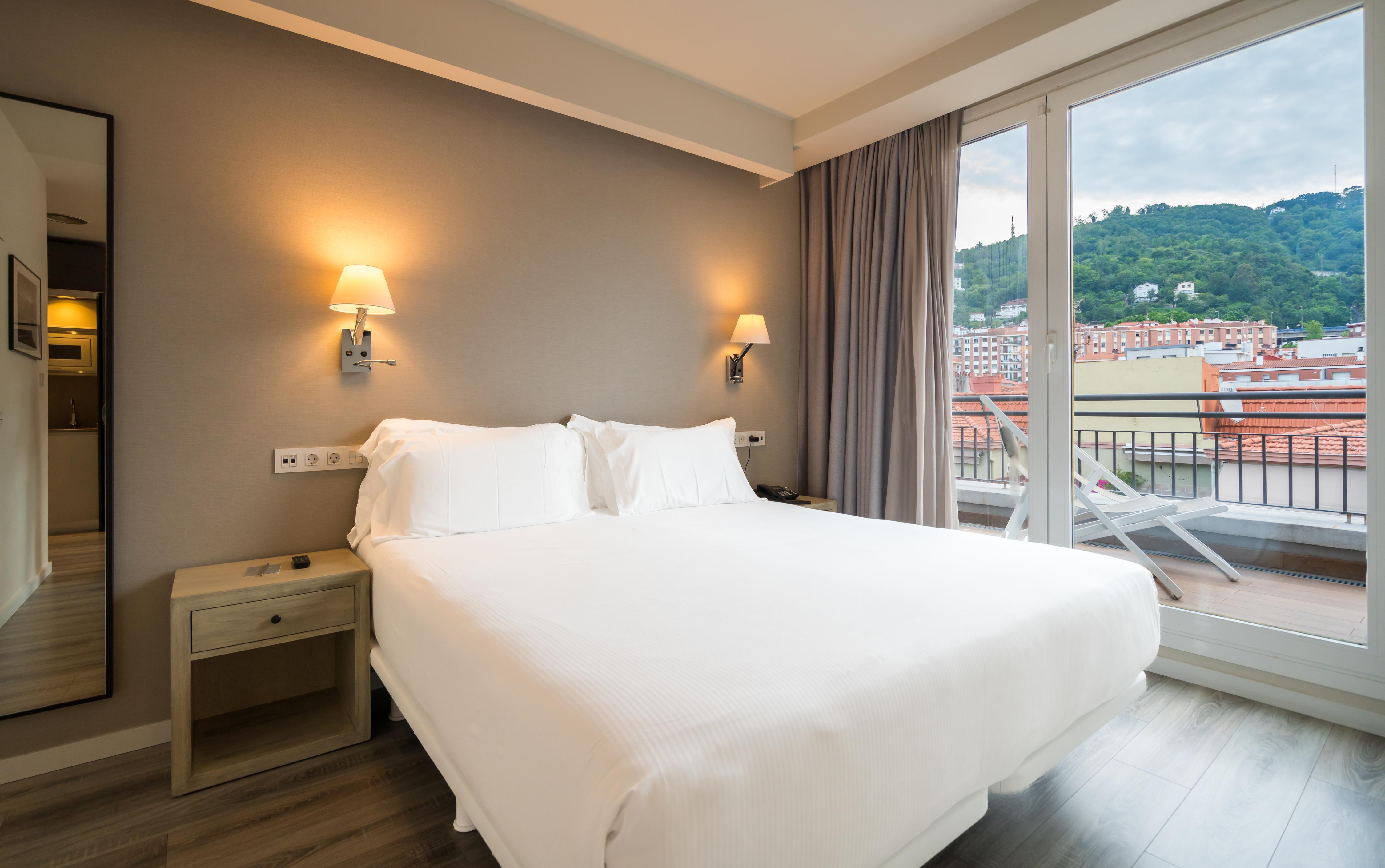 abba Suites Bilbao - Tap to explore photos
