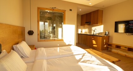 Empire Studio Apartments Room Type - Super Deluxe Room with Balcony and kitchenette Empire Studio Apartments Room Type - Super Deluxe Room with Balcony and kitchenette